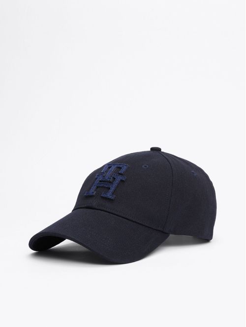 Gorra azul de béisbol con monograma TH