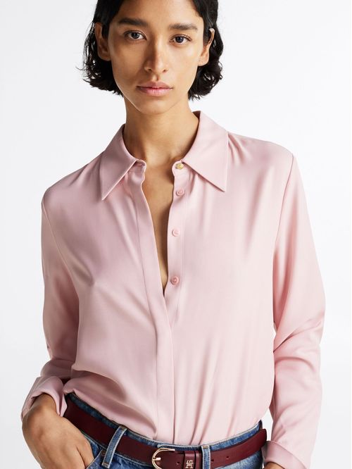 Camisa rosa de corte amplio y Tapeta oculta