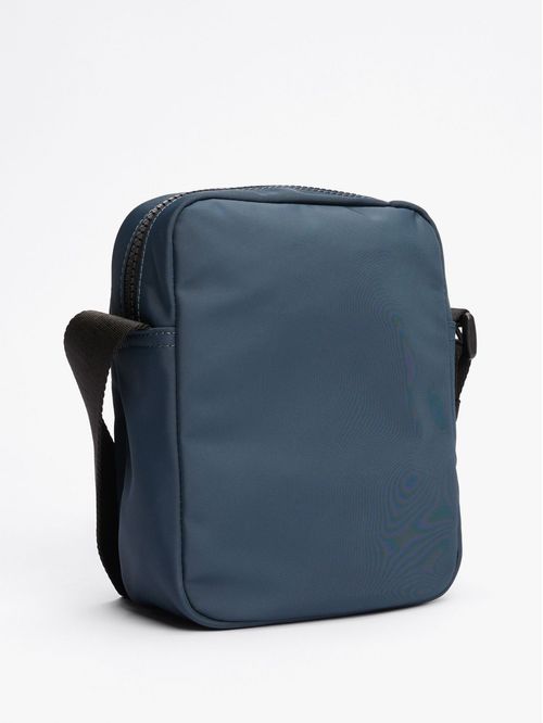 Bolso azul reporter con logo engomado