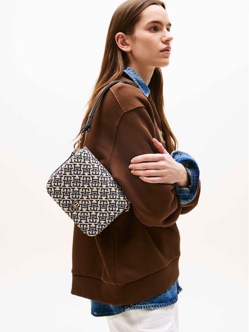 Bolso azul oscuro mensajero con monograma TH en jacquard