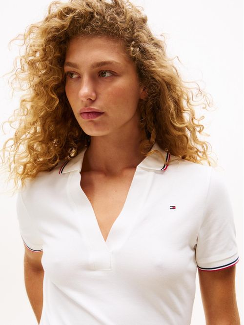 Polo blanco 1985 de corte slim con ribetes