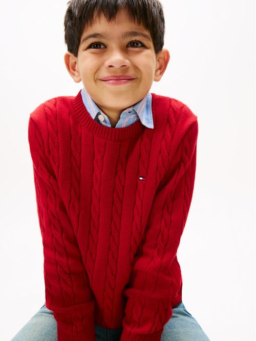 Saco rojo de punto trenzado y cuello redondo