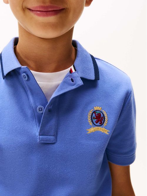 Polo azul de punto interlock con escudo TH
