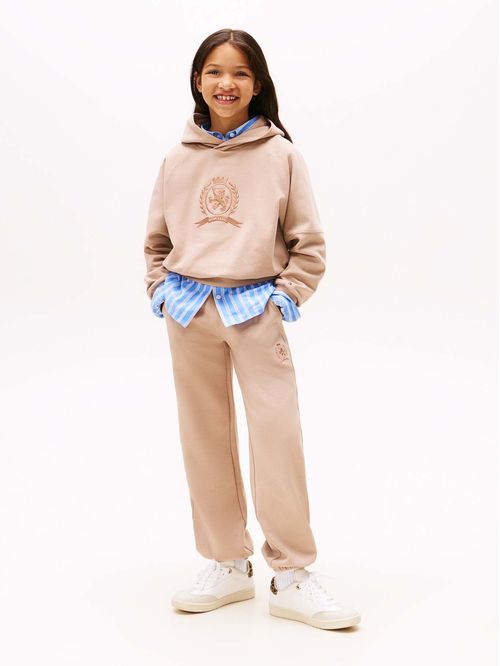 Joggers café de punto con escudo bordado