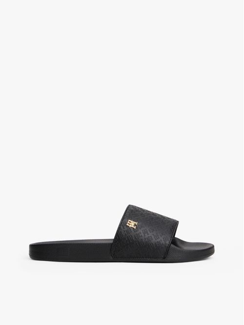 Sandalias negro con monogramas TH en relieve