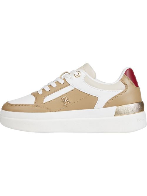 Tenis beige de cuero con monograma TH